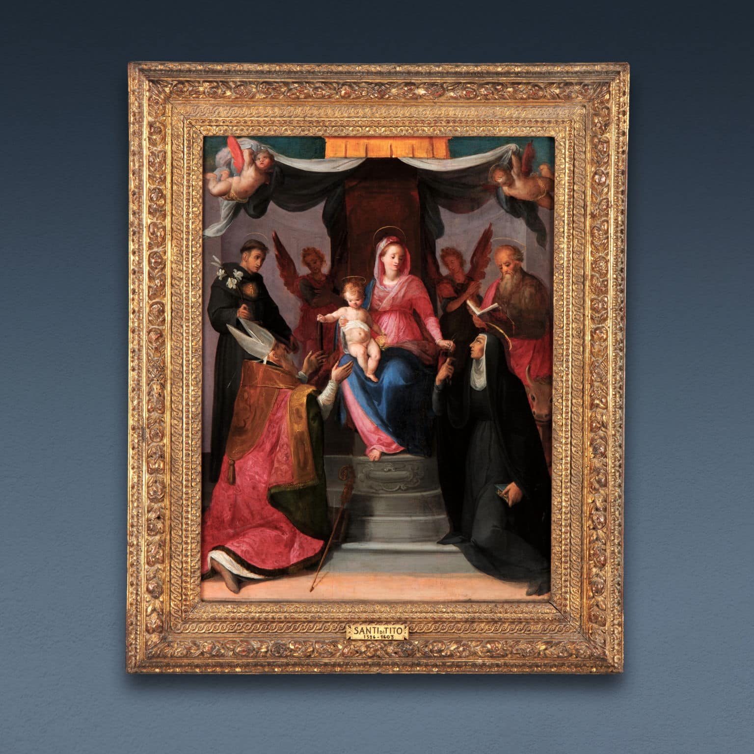 Enthroned Madonna with Child between Angels and Saints Nicholas of Tolentino