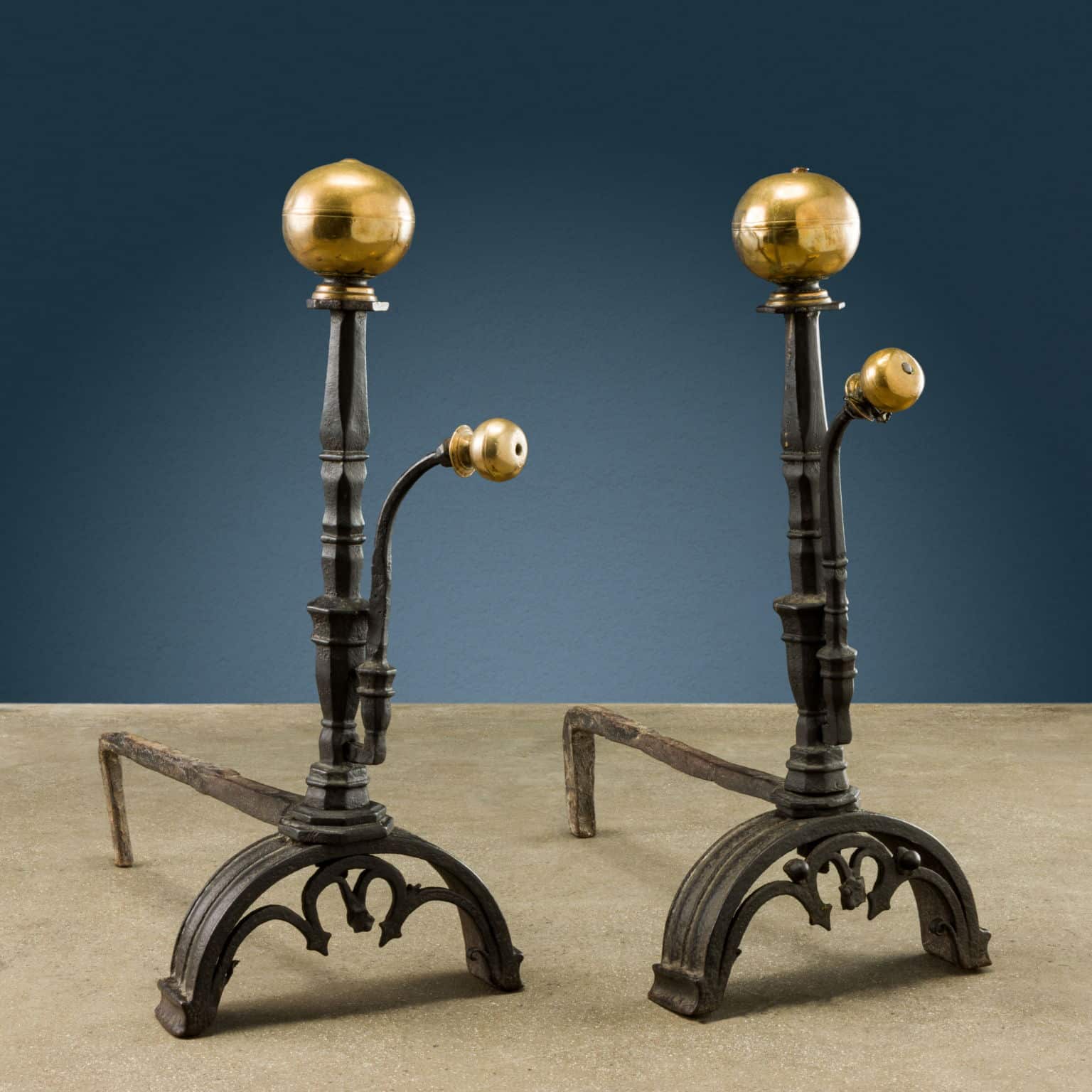 Pair of wrought iron andirons, Florence, late 16th-early 17th century