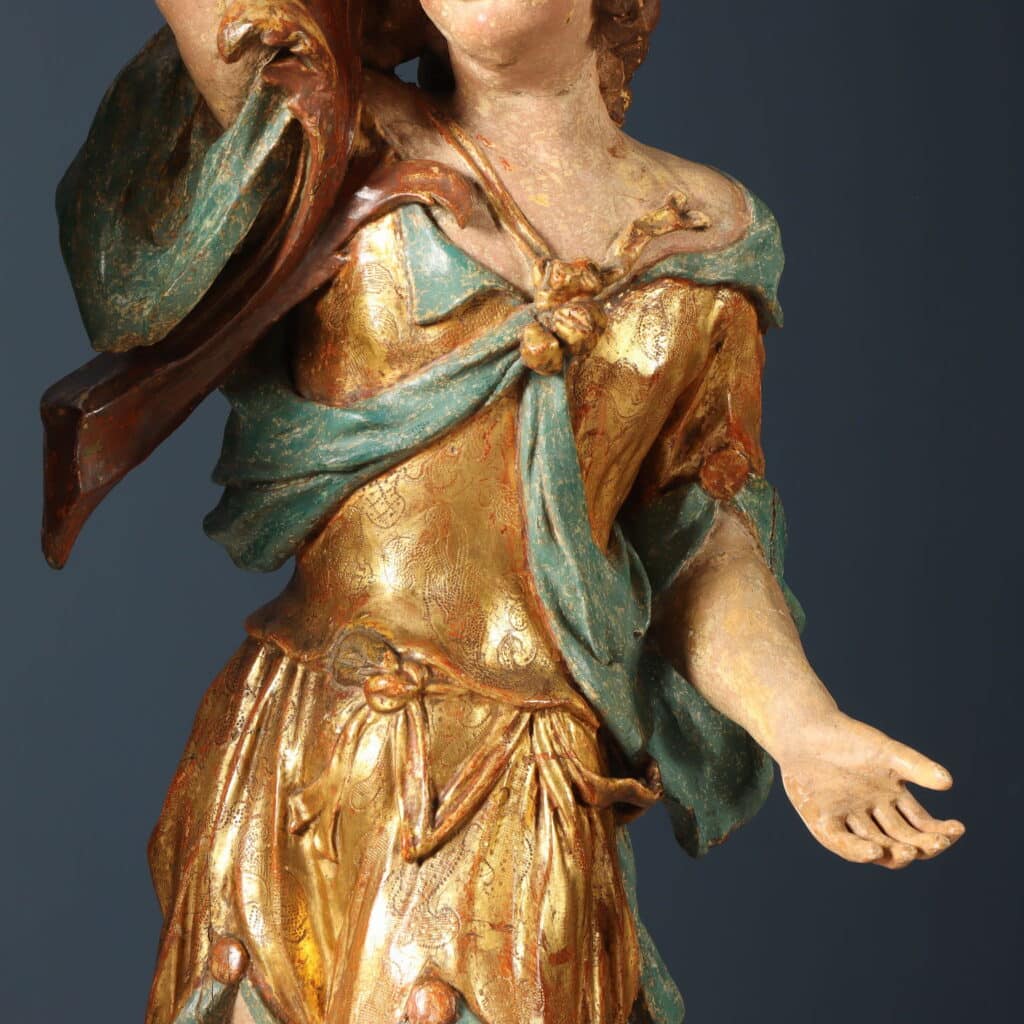 Coppia di figure con cornucopia Legno di tiglio intagliato dipinto e dorato