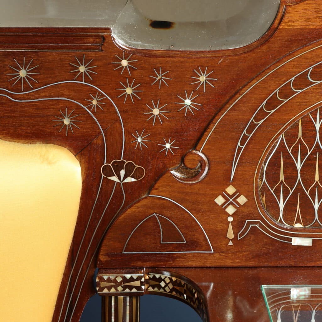 Sofa with integrated mirror, one of the finest examples of Quarti's mature Art Nouveau design.