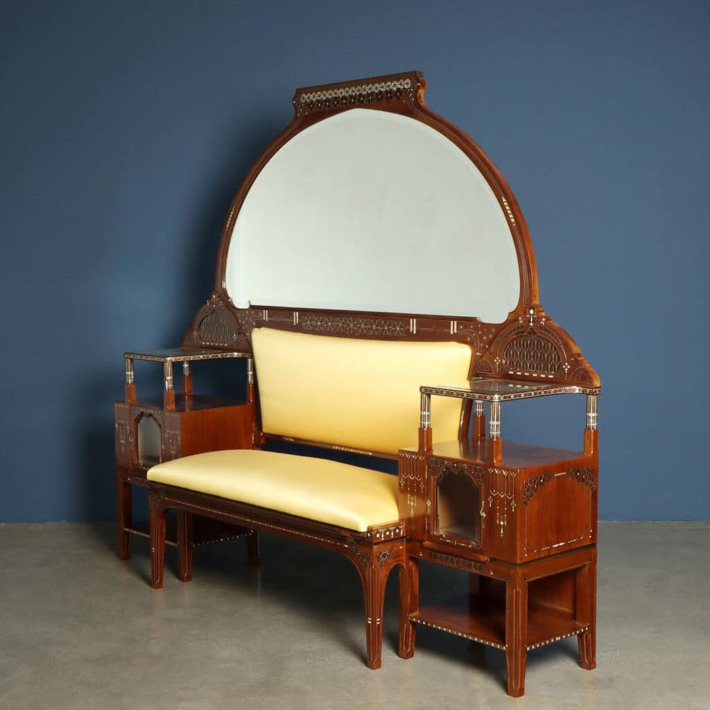 Elegant mahogany sofa with brass stringing and mother-of-pearl decoration.